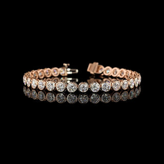 Round bezel lab-grown diamond tennis bracelet with 10 carats total weight, featuring sparkling 30-point diamonds arranged in a sleek design.