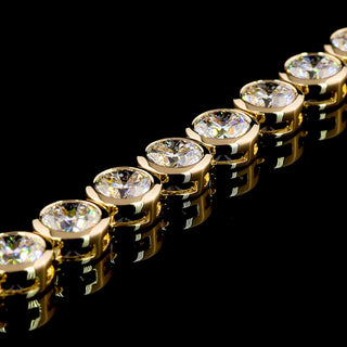 15 CTW round bezel lab-grown diamond tennis bracelet with yellow gold setting, showcasing sparkling diamonds and elegant design.