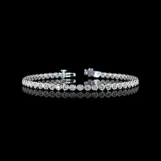 LabGrownDiamonds.com 3 CTW round bezel lab-grown diamond tennis bracelet in white gold, 7-inch size with 51 diamonds.