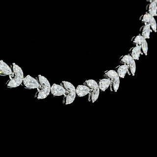 Floral pear and marquise lab-grown diamond tennis necklace with 11-carat total weight on a white gold chain.