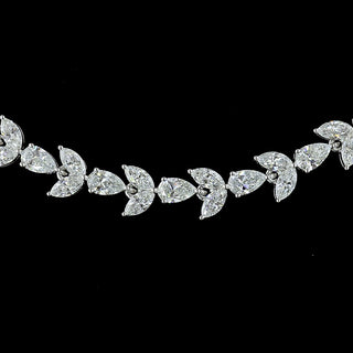 Floral pear and marquise lab-grown diamond tennis necklace with 11-carat total weight, 16-inch white gold chain, elegant jewelry piece