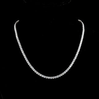 Round lab-grown diamond tennis necklace with 12pt, 1.5ct total weight in white gold, showcasing sparkling diamonds on a 16-inch chain.