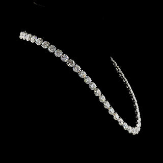 Round lab-grown diamond tennis necklace with 58 diamonds totaling 8.2 carats, 16-inch white gold chain, and elegant design.