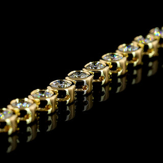 14k yellow gold lab-grown diamond tennis necklace with 6 carats total weight of round bezel-set diamonds, 16-inch length.