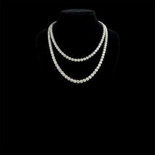 Opera length Lab Grown Diamond tennis necklace with round cut diamonds, 60pt each, 100ct total, in white gold setting.
