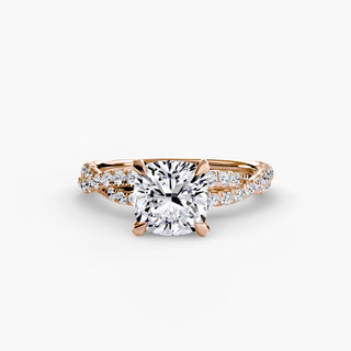 Twisted pavé engagement ring setting in rose gold, featuring a cushion-cut lab grown center diamond with a twisted pavé diamond band. || #metal_rose gold #diamond shape_cushion