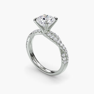 Twisted pavé engagement ring setting in white gold with a cushion-cut lab grown center diamond and twisted pavé diamond band, three-quarter view. || #metal_white gold|platinum #diamond shape_cushion