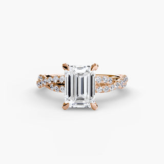 Twisted pavé engagement ring setting in rose gold, featuring an emerald-cut lab grown center diamond with a twisted pavé diamond band. || #metal_rose gold #diamond shape_emerald