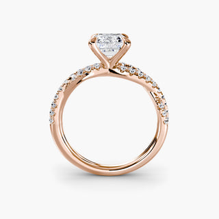 Twisted pavé engagement ring setting in rose gold, side profile view showing the twisted pavé band with an emerald-cut lab grown center diamond. || #metal_rose gold #diamond shape_emerald