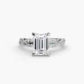Twisted pavé engagement ring setting in white gold, featuring an emerald-cut lab grown center diamond with a twisted pavé diamond band. || #metal_white gold|platinum #diamond shape_emerald