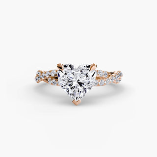 Twisted pavé engagement ring setting in rose gold, featuring a heart-shaped lab grown center diamond with a twisted pavé diamond band. || #metal_rose gold #diamond shape_heart