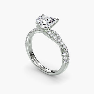 Twisted pavé engagement ring setting in white gold with a heart-shaped lab grown center diamond and twisted pavé diamond band, three-quarter view. || #metal_white gold|platinum #diamond shape_heart