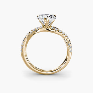 Twisted pavé engagement ring setting in yellow gold, side profile view showing the twisted pavé band with a heart-shaped lab grown center diamond. || #metal_yellow gold #diamond shape_heart