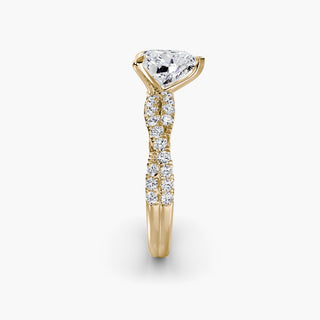 Twisted pavé engagement ring setting in yellow gold showing the twisted band profile, with a heart-shaped lab grown center diamond. || #metal_yellow gold #diamond shape_heart