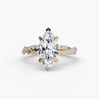 Twisted pavé engagement ring setting in yellow gold, featuring a marquise-cut lab grown center diamond with a twisted pavé diamond band. || #metal_yellow gold #diamond shape_marquise