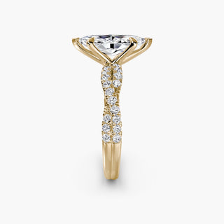 Twisted pavé engagement ring setting in yellow gold showing the twisted band profile, with a marquise-cut lab grown center diamond. || #metal_yellow gold #diamond shape_marquise