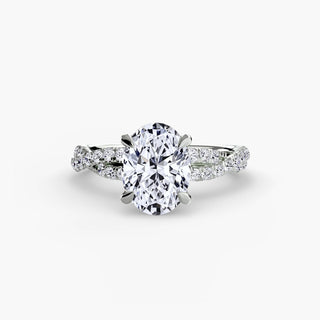 Twisted pavé engagement ring setting in white gold, featuring an oval-cut lab grown center diamond with a twisted pavé diamond band. || #metal_white gold|platinum #diamond shape_oval