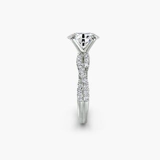 Twisted pavé engagement ring setting in white gold showing the twisted band profile, with an oval-cut lab grown center diamond. || #metal_white gold|platinum #diamond shape_oval