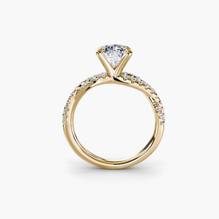 Twisted pavé engagement ring setting in yellow gold, side profile view showing the twisted pavé band with an oval-cut lab grown center diamond. || #metal_yellow gold #diamond shape_oval