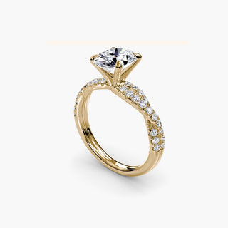 Twisted pavé engagement ring setting in yellow gold with an oval-cut lab grown center diamond and twisted pavé diamond band, three-quarter view. || #metal_yellow gold #diamond shape_oval