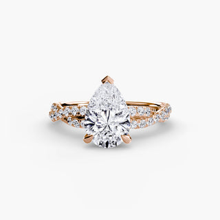 Twisted pavé engagement ring setting in rose gold, featuring a pear-shaped lab grown center diamond with a twisted pavé diamond band. || #metal_rose gold #diamond shape_pear