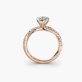 Twisted pavé engagement ring setting in rose gold, side profile view showing the twisted pavé band with a pear-shaped lab grown center diamond. || #metal_rose gold #diamond shape_pear