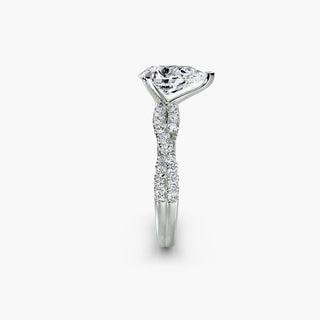 Twisted pavé engagement ring setting in white gold showing the twisted band profile, with a pear-shaped lab grown center diamond. || #metal_white gold|platinum #diamond shape_pear