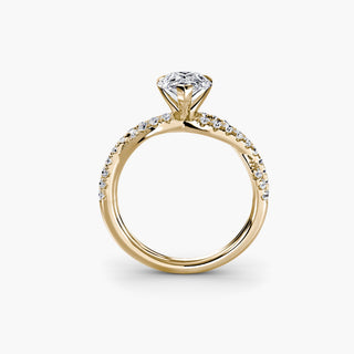 Twisted pavé engagement ring setting in yellow gold, side profile view showing the twisted pavé band with a pear-shaped lab grown center diamond. || #metal_yellow gold #diamond shape_pear