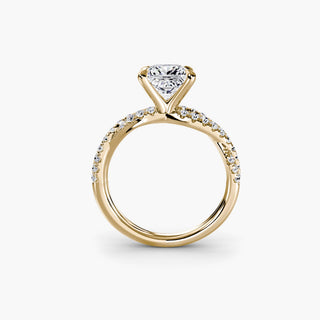 Twisted pavé engagement ring setting in yellow gold, side profile view showing the twisted pavé band with a princess-cut lab grown center diamond. || #metal_yellow gold #diamond shape_princess