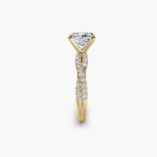 Twisted pavé engagement ring setting in yellow gold showing the twisted band profile, with a princess-cut lab grown center diamond. || #metal_yellow gold #diamond shape_princess