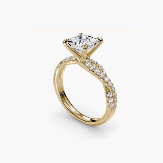 Twisted pavé engagement ring setting in yellow gold with a princess-cut lab grown center diamond and twisted pavé diamond band, three-quarter view. || #metal_yellow gold #diamond shape_princess