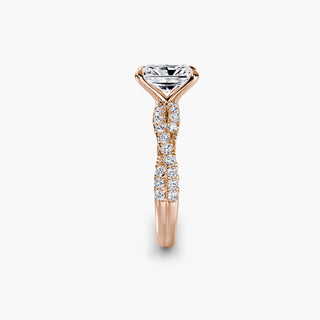 Twisted pavé engagement ring setting in rose gold showing the twisted band profile, with a radiant-cut lab grown center diamond. || #metal_rose gold #diamond shape_radiant