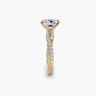 Twisted pavé engagement ring setting in yellow gold showing the twisted band profile, with a radiant-cut lab grown center diamond. || #metal_yellow gold #diamond shape_radiant