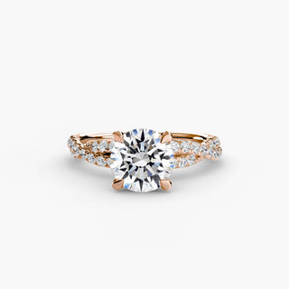 Twisted pavé engagement ring setting in rose gold, featuring a round lab grown center diamond with a twisted pavé diamond band. || #metal_rose gold #diamond shape_round
