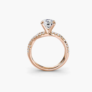 Twisted pavé engagement ring setting in rose gold, side profile view showing the twisted pavé band with a round lab grown center diamond. || #metal_rose gold #diamond shape_round