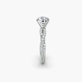 Twisted pavé engagement ring setting in white gold showing the twisted band profile, with a round lab grown center diamond. || #metal_white gold|platinum #diamond shape_round