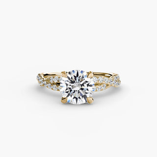 Twisted pavé engagement ring setting in yellow gold, featuring a round lab grown center diamond with a twisted pavé diamond band. || #metal_yellow gold #diamond shape_round