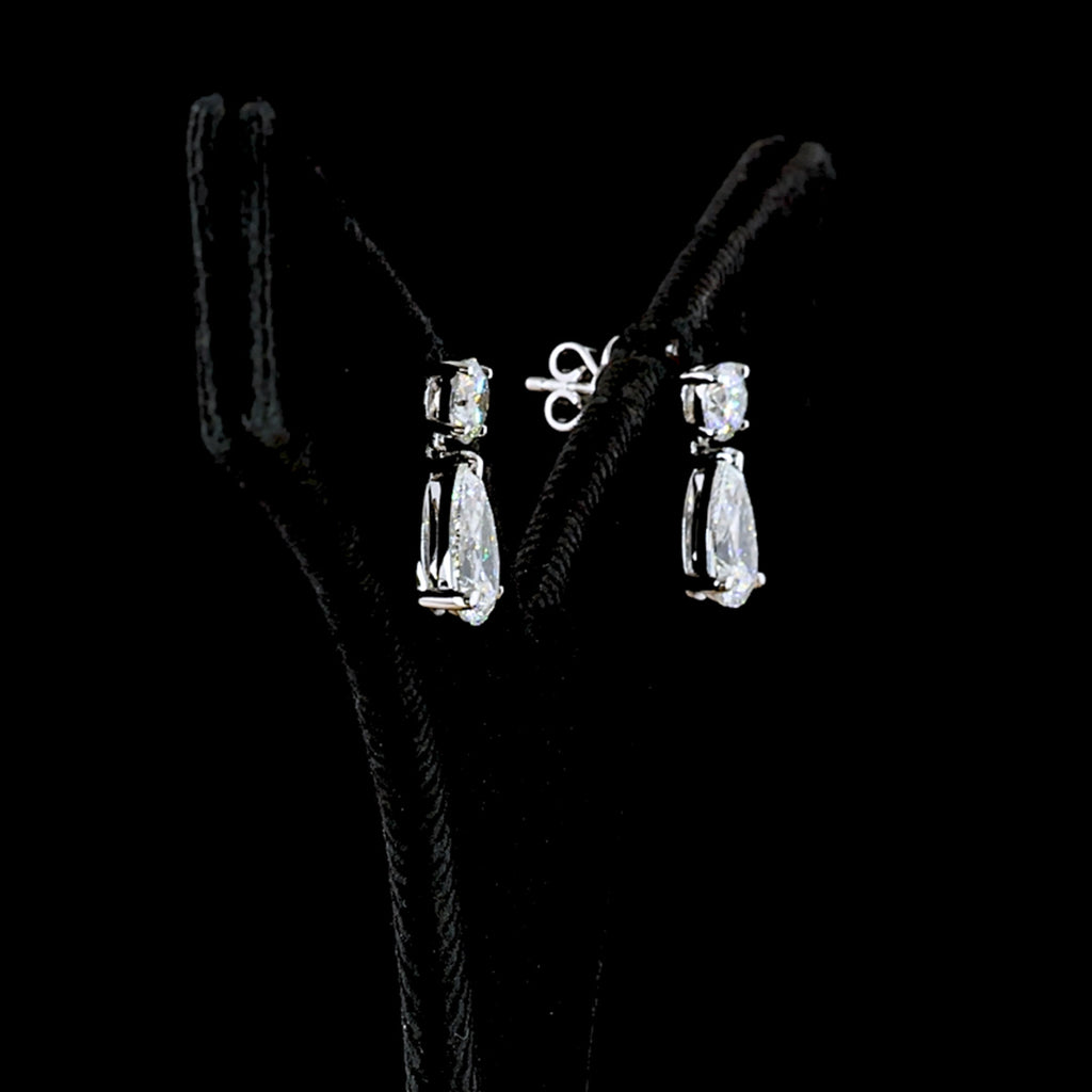 Video of Round and Pear drop earrings in 14k white gold, prong setting, with 0.40ct round and 1.10ct pear lab grown diamonds. || #total carat weight_3