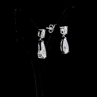 Video of of Round and Pear drop earrings in 14k white gold, claw prong setting, with 0.75ct round and 1.75ct pear lab grown diamonds. || #total carat weight_5