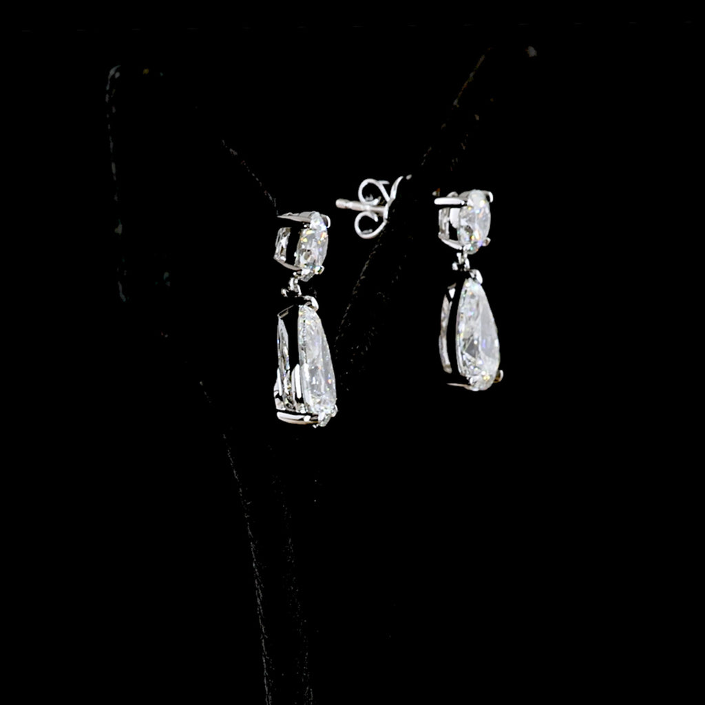 Video of of Round and Pear drop earrings in 14k white gold, claw prong setting, with 0.75ct round and 1.75ct pear lab grown diamonds. || #total carat weight_5