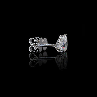 Video of 0.50 carat Pear-shaped lab grown diamond stud earrings in 14k white gold, martini setting, 1 carat total pear studs.