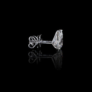 Video of of Pear-shaped lab grown diamond stud earrings in 14k white gold, claw prong setting, 2 carats total (1 carat each), showing setting from multiple angles.