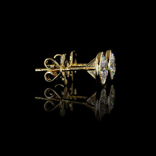 Video of of Round lab grown diamond stud earrings in 14k yellow gold, martini bezel setting, 2 carats total (1 carat each). || #total carat weight_2