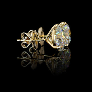 Video of round lab grown diamond stud earrings with three-prong martini settings, 5 carats total weight (2.5 carats each) in yellow gold. || #metal_yellow gold
