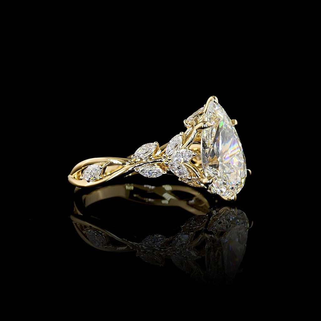 Video of Lab Grown Diamond nature-inspired Engagement Ring with twisted vine design  in yellow gold, with a 2.75 carat pear diamond center stone, 3.25 carats total weight. || #diamond shape_pear