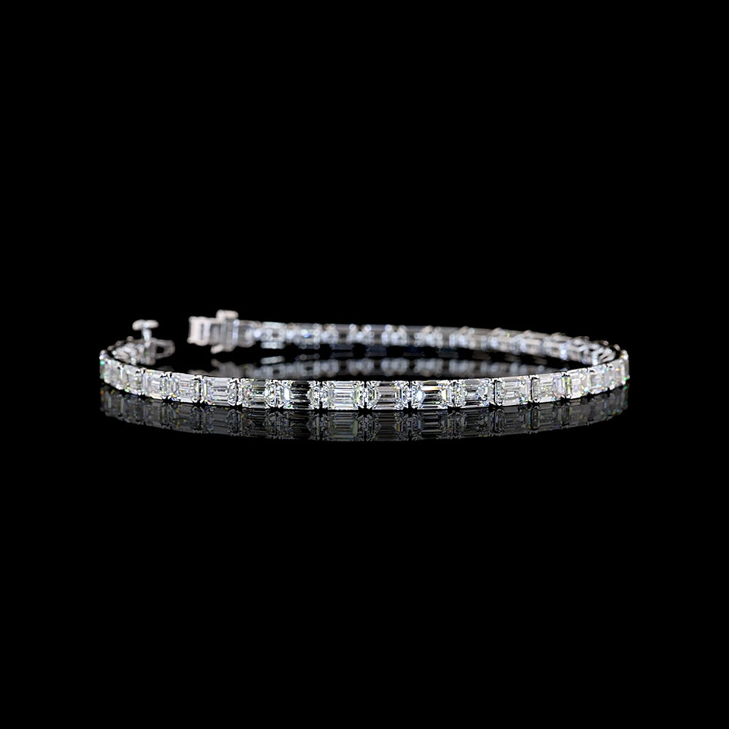 Video of East-West Emerald-cut lab grown diamond tennis bracelet in 14k white gold, prong setting, 10 carats total.