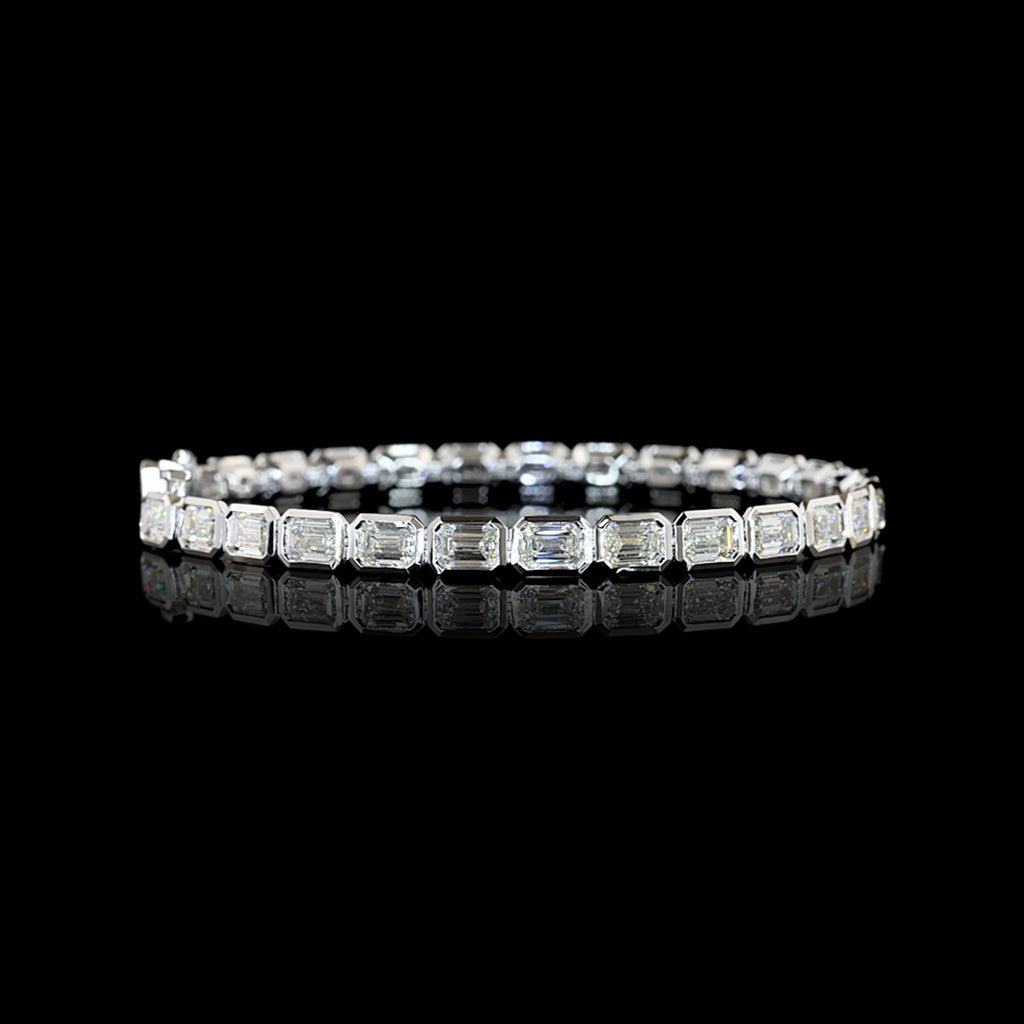 Video of East-West Emerald-cut lab grown diamond tennis bracelet in 14k white gold, bezel setting, 10 carat total weight.