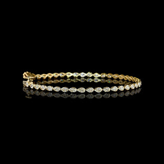 Video of East-West Pear-shaped lab grown diamond tennis bracelet in 14k yellow gold bezel setting, 2 carats total, with 5-pointer diamonds.
